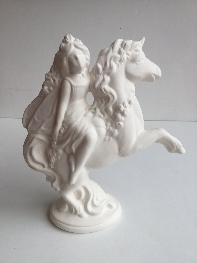 Fairy riding a unicorn