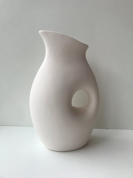 Vase with hole
